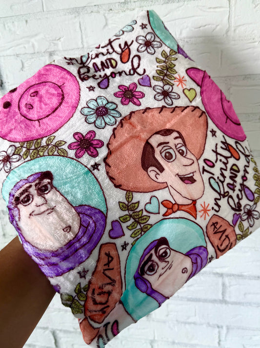 Toy friends and flowers blanket